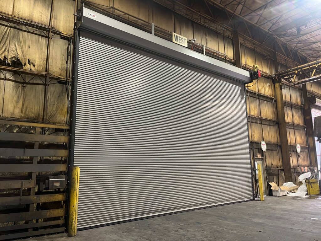 Rolling steel commercial garage door