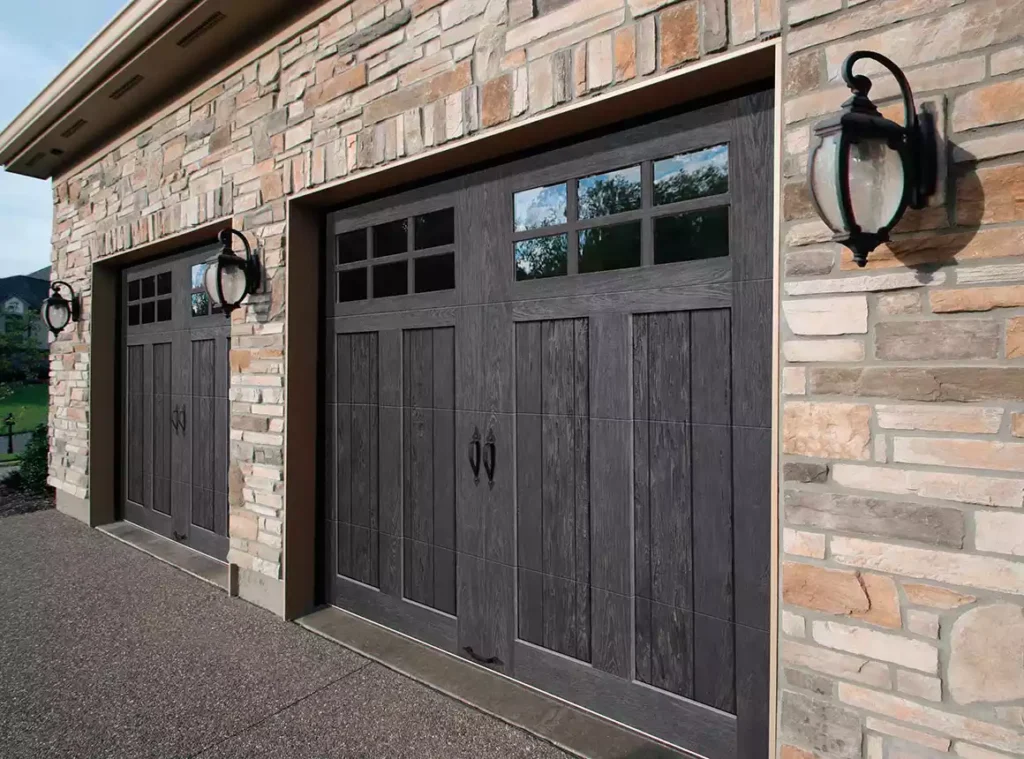 Dark wood garage doors with windows; garage door services near Houston, TX